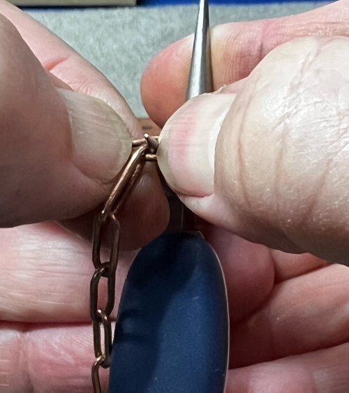 Susan LeGuyader's Altering an Existing Chain - From Paperclip to Petal Links - , Contemporary Wire Jewelry, Making Chain, Chain Making , Design,  I slid the link onto a narrow pair of round nose pliers
